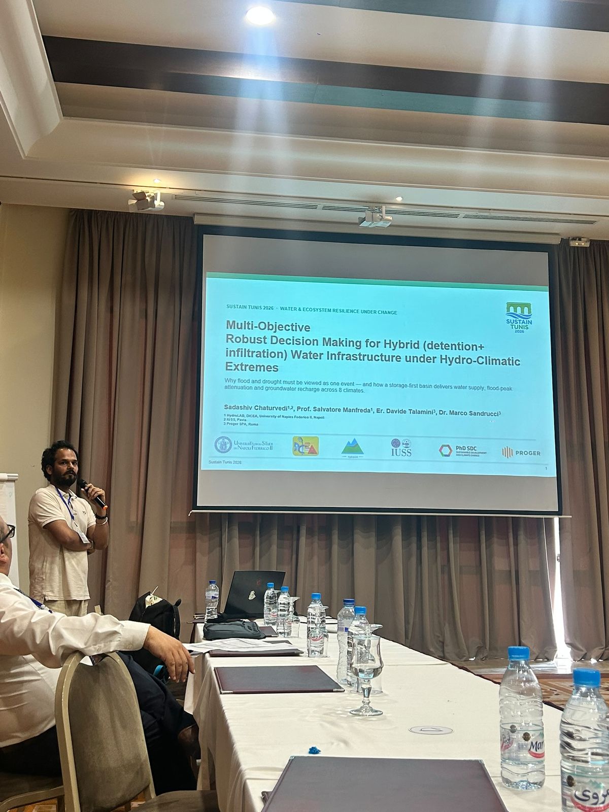 Sadashiv Chaturvedi presenting his Sustain Tunis 2026 paper on hybrid water infrastructure